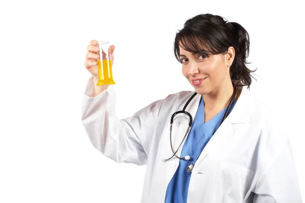 stock image Female doctor examining test flasks