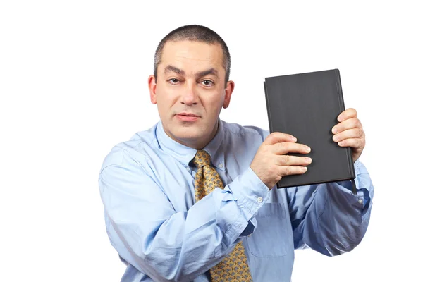 Obchodní muž držící knihu — Stock fotografie
