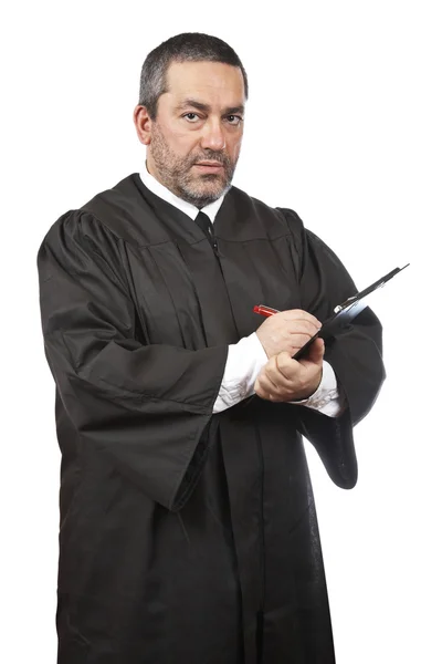 Allvarliga manliga domare skriver — Stockfoto