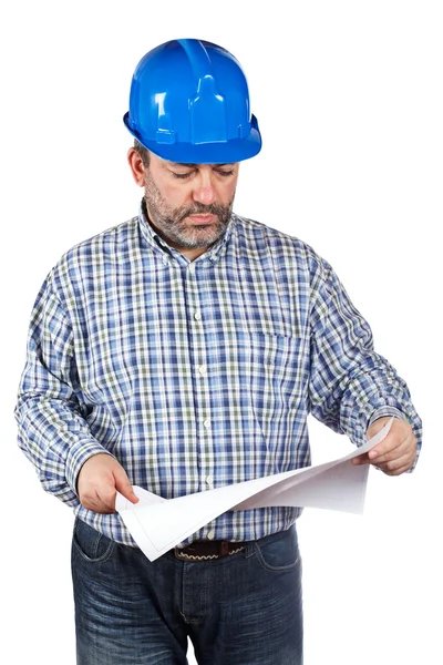 Obrero de la construcción sosteniendo planos — Foto de Stock