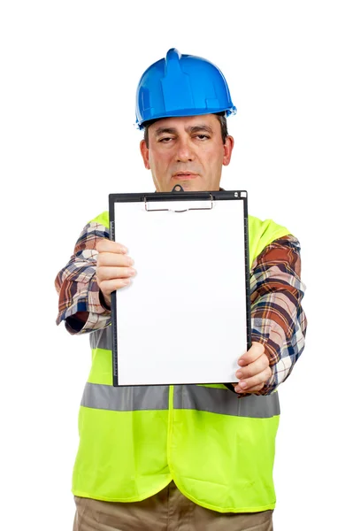 Trabalhador da construção mostrando um caderno em branco — Fotografia de Stock