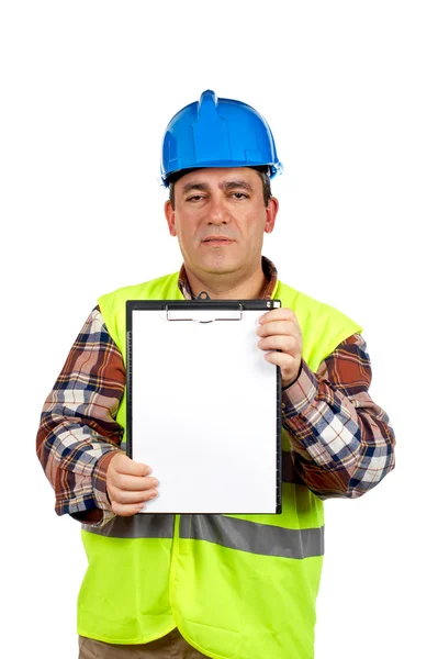 Construction worker showing a blank notebook — ストック写真