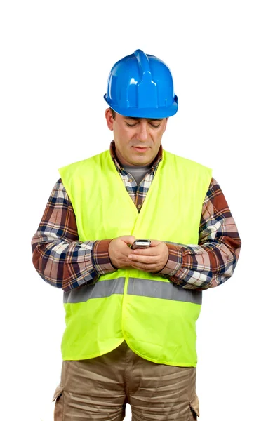 Stavební dělník posílání sms — Stock fotografie
