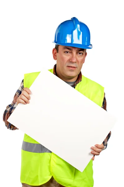 Trabajador de la construcción sosteniendo el cartel en blanco —  Fotos de Stock