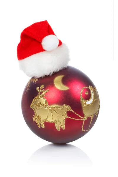 Red ball with Christma hat — Stock Photo, Image