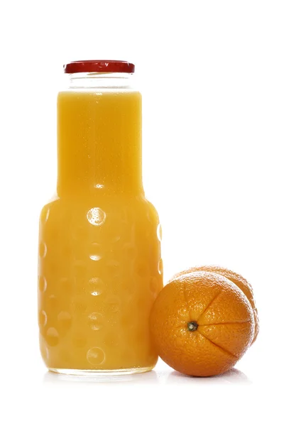 Бутылка апельсинового сока — стоковое фото