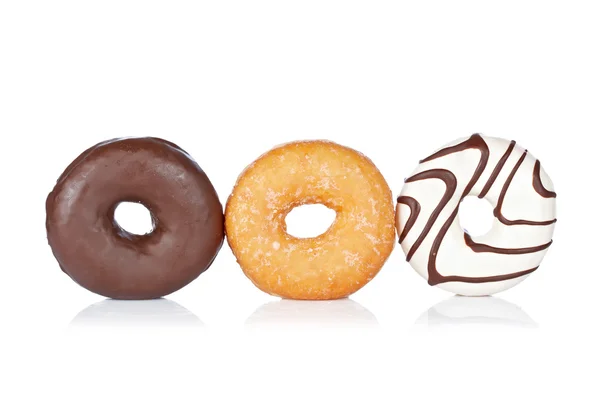 Três deliciosos donuts — Fotografia de Stock