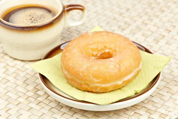 Heerlijke donut met koffie — Stockfoto
