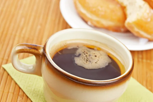 Deliciosas rosquillas con café —  Fotos de Stock