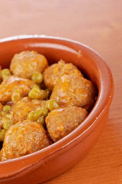 Fresh meatballs with peas — Stock Photo, Image