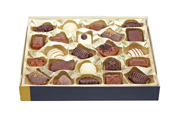 Cukorka, csokoládé egy arany doboz — Stock Fotó