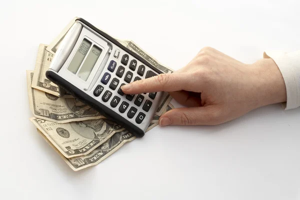 Cálculo sobre um fã de dinheiro — Fotografia de Stock