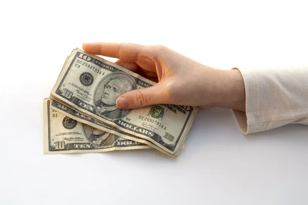 Hand som håller ett fan av tio dollar — Stockfoto