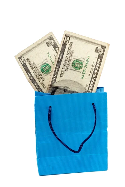 Uma nota de dólar num saco de compras. Com caminho de recorte — Fotografia de Stock