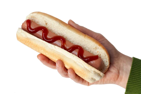 Con in mano un hot dog. Percorso di taglio incluso — Foto Stock