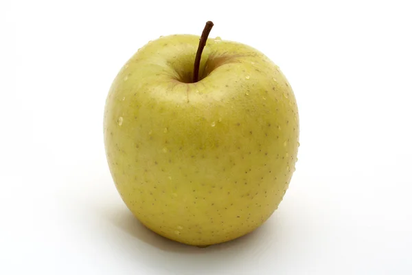Yellow apple with drops — Stock Photo, Image