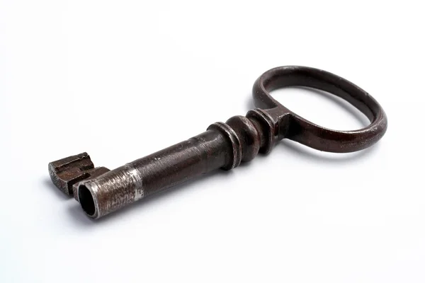 Old key on white background — Stock Photo, Image