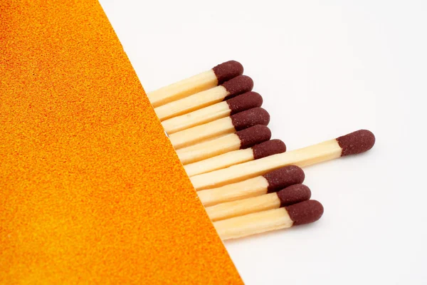 One match stick spent among match sticks — Stock Photo, Image