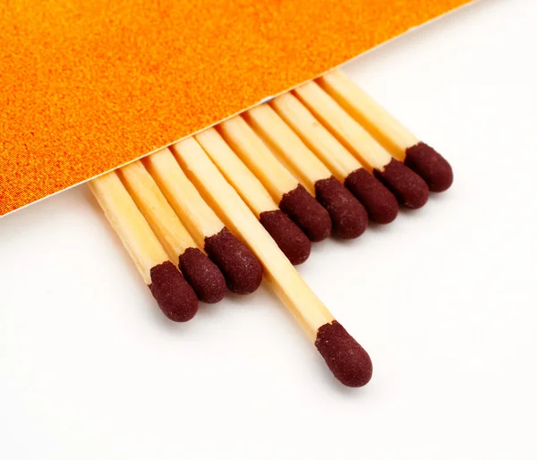 One match stick spent among match sticks — Stock Photo, Image