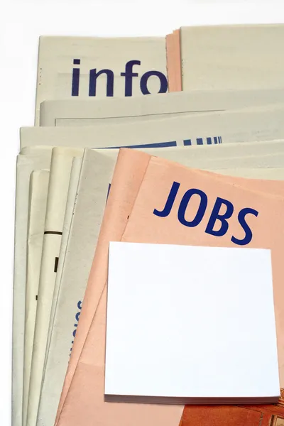 stock image Stacked jobs newspapers