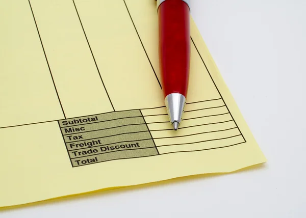 Blank invoice with pen — Stock Photo, Image