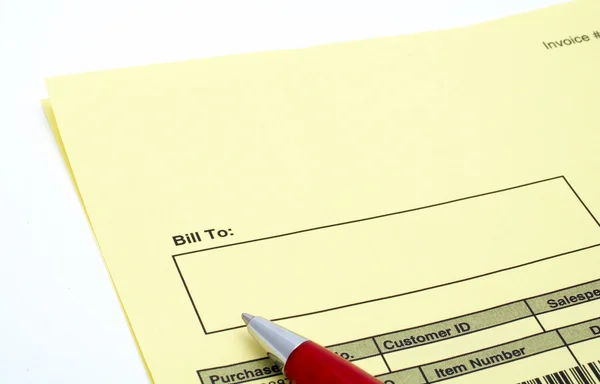 Close up Blank invoice with pen — Stock Photo, Image