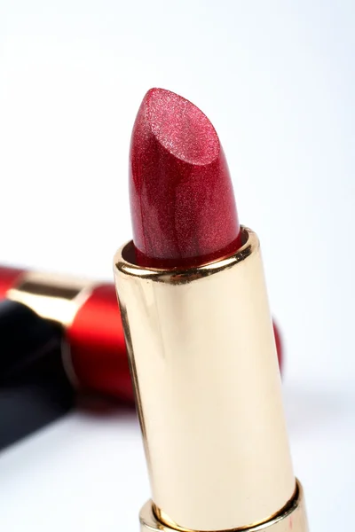 Tube of red lipstick. Macro shot — Stock Photo, Image