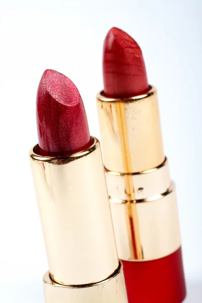 Twee buizen van rode lippenstift — Stockfoto