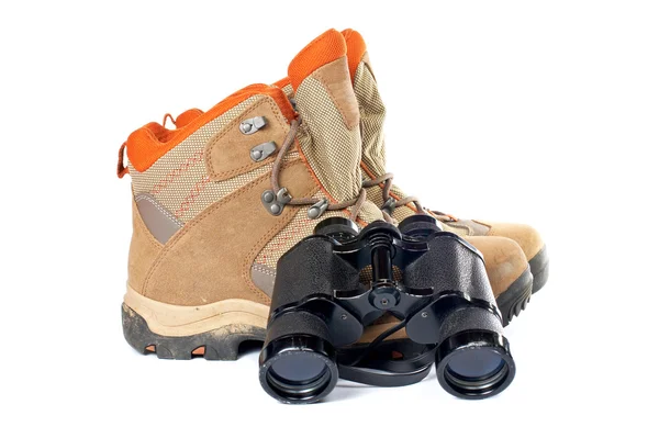 Hiking boots and binoculars — Stock Photo, Image