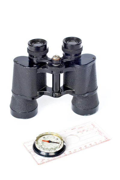 Compass and binoculars — Stock Photo, Image