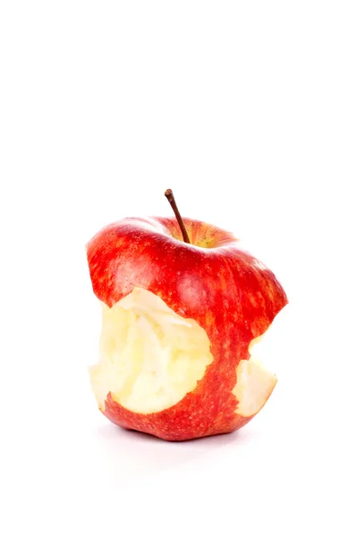 Červené jablko s některé kousnutí — Stock fotografie