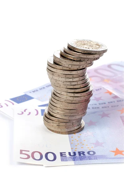 Монети і євро рахунки — стокове фото