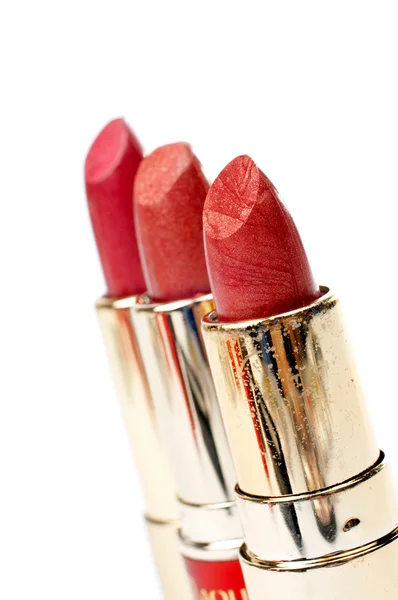 Drie buizen van rode lippenstift — Stockfoto