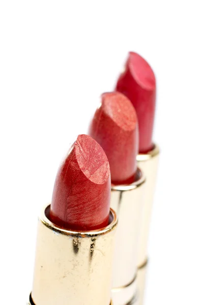 Drie buizen van rode lippenstift — Stockfoto