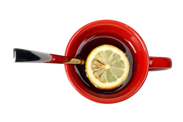 Rode kopje thee met citroen en de lepel — Stockfoto