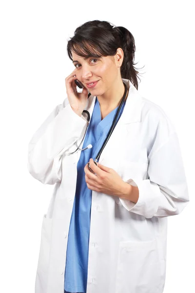 Médecin féminin parlant avec téléphone Images De Stock Libres De Droits