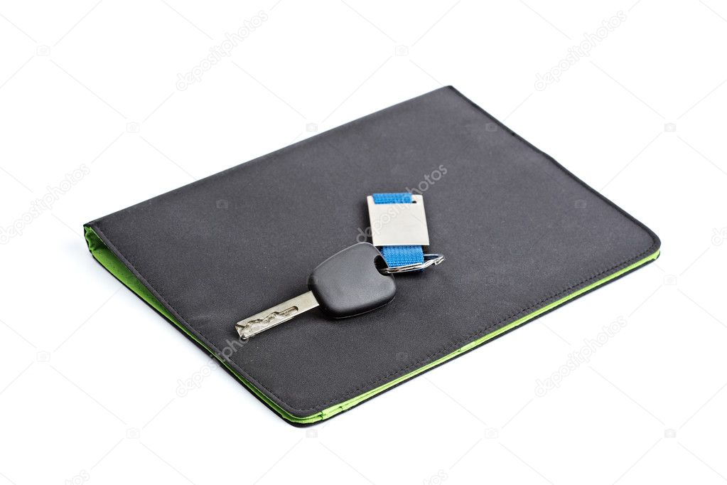 Car key and black folder