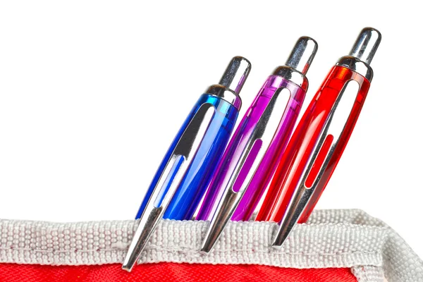Drie pennen in het geval van een potlood — Stockfoto