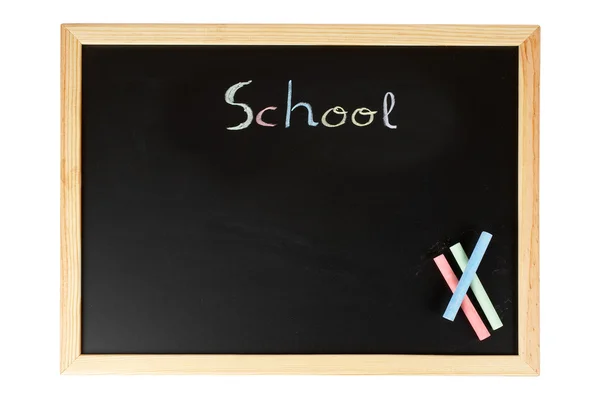 Schoolbord met gekleurde krijtjes — Stockfoto