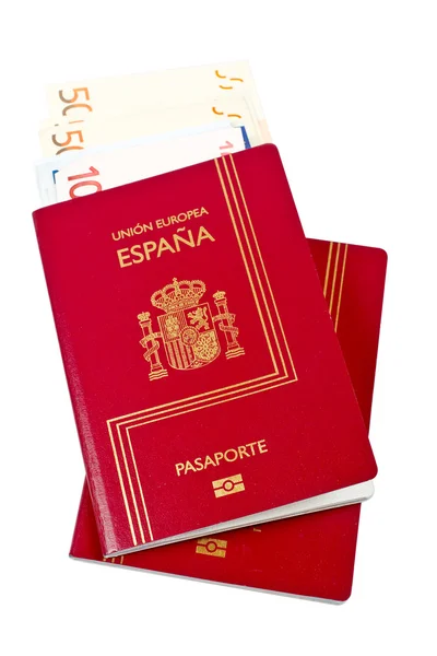 Два паспорти Іспанії і гроші — стокове фото