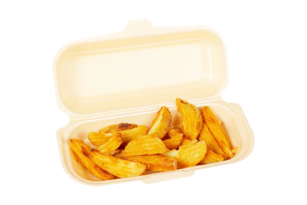 Aardappelen op piepschuim container — Stockfoto