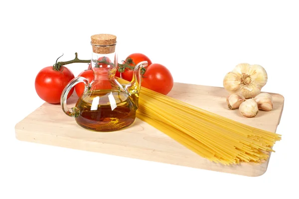 Pomodori, olio d'oliva, aglio e spaghetti — Foto Stock