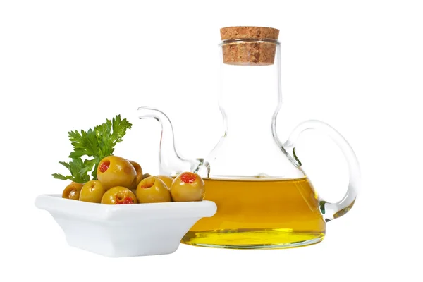 Oilcan and olives with parsley — Stock Photo, Image