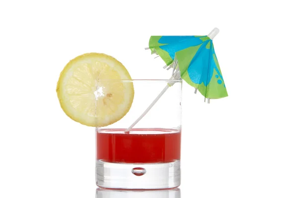 Red juice with umbrella — Stock Photo, Image