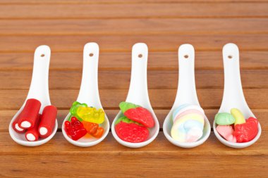 Candies in the spoons clipart