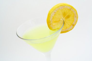Detail of green cocktail with lemon clipart