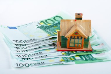 House and euro bills clipart