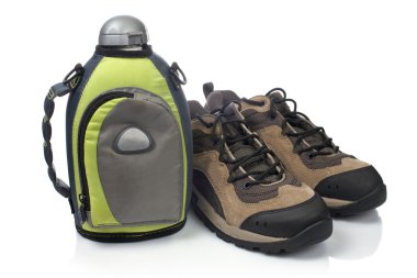 Hiking boots and canteen clipart