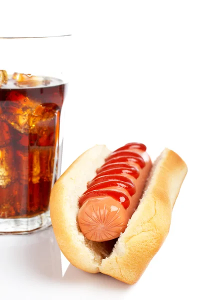 A hot dog and soda glass — Stock Photo, Image