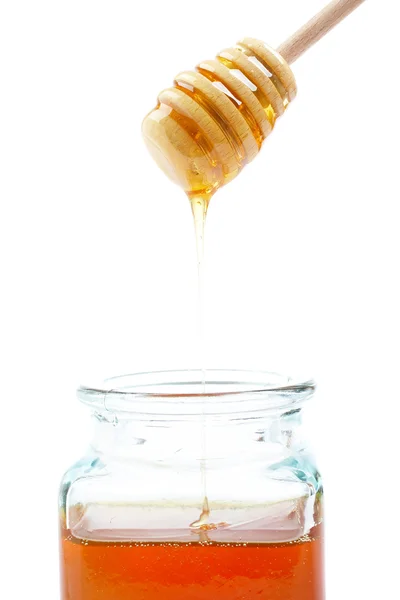꿀을 붓는 — 스톡 사진